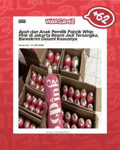Close-up of a pink spray paint can held in a hand, with boxes of similar cans in the background.