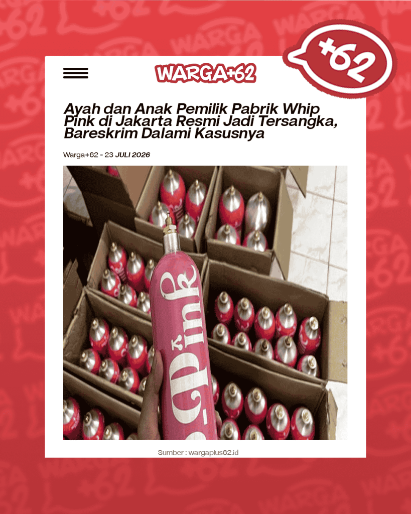 Close-up of a pink spray paint can held in a hand, with boxes of similar cans in the background.